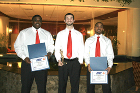 From left to right, Rio Grande's Shaun Gunnell, Evan Legg and Jermaine Warmack were among six RedStorm players honored.